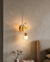 elysian-flora-gold-wall-lamp-for-bedroom.webp